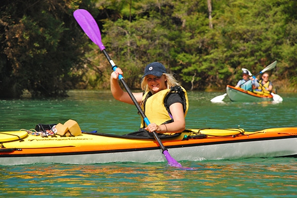 kayaking on a holdiay programme in the abel tasman