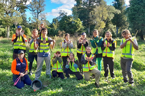 student group photo helping out the bat recovery project at pelorus