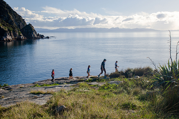 students exploring the coastline